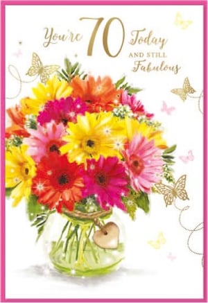 a 70th birthday card with a vase of flowers and butterflies .