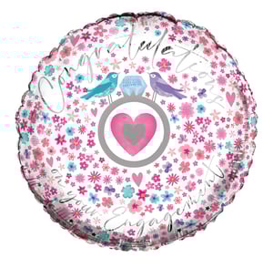 A balloon that says "you're engaged" on it.
(Note: No grammatical errors were found in the sentence provided.)