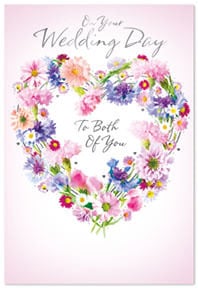 a wedding day card with a heart made of flowers .