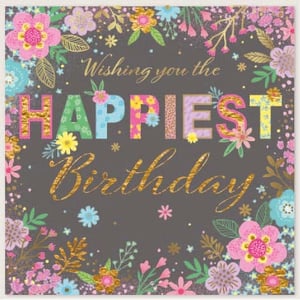 a birthday card with flowers and the words `` wishing you the happiest birthday '' .