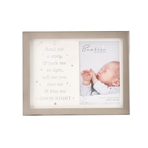 a picture of a baby in a frame with a poem on it .