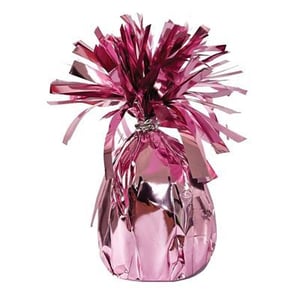 a pink balloon weight wrapped in pink foil on a white background .