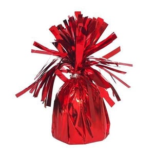 a red balloon weight with red tinsel on a white background .