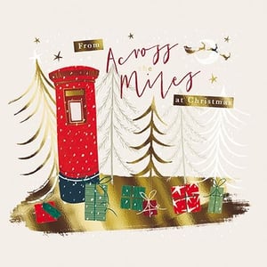 Send warm wishes this festive season with our charming 'Across The Miles' Christmas cards. This delightful design features a classic British red post box, nestled amongst shimmering Christmas trees and beautifully wrapped presents, all under a sky dotted with snowflakes and a distant Santa sleigh.

Perfect for connecting with loved ones near or far, these cards beautifully convey the spirit of Christmas. The elegant gold accents and heartfelt message make them a truly special choice for the holidays. From the Great British Card Company, each pack contains 6 cards, ready to bring smiles to your customers' faces. A wonderful way to share festive cheer!