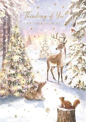 Share the magic of the festive season with this exquisite 'Thinking Of You' Christmas card from Ling. Adorned with a breathtaking snowy forest scene, it captures the serene beauty of winter. Majestic deer, a sweet fawn, and a curious squirrel gather amongst twinkling, snow-laden Christmas trees, creating a truly heartwarming tableau. The delicate golden accents and falling snowflakes add a touch of sparkle, making this card perfect for sending thoughtful Christmas wishes to loved ones. Each pack contains 6 beautifully crafted cards, ready to delight your customers.