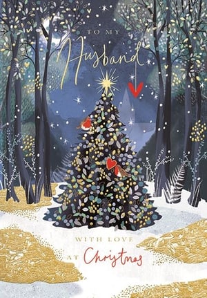 Help your customers celebrate their husband this Christmas with this beautiful card from Ling. Set in a tranquil winter forest, the design features a festive Christmas tree, adorned with sparkling lights and a shining star. Two charming robins nestle on the branches, one accompanied by a loving red heart, adding a sweet touch. The elegant script reads 'TO MY Husband' and 'WITH LOVE AT Christmas', conveying a heartfelt message. Golden accents on the snowy ground provide a luxurious finish. This delightful card is supplied in a convenient pack of 6, ready to bring festive cheer.