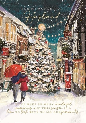 Offer your customers a truly special way to celebrate their love this Christmas with this enchanting card for a wonderful husband. Featuring a beautifully illustrated snowy street scene, complete with a twinkling Christmas tree and a loving couple, it evokes warmth and festive romance. The heartfelt message, "FOR MY WONDERFUL Husband" and "WE'VE MADE SO MANY wonderful memories AND THIS season is A time to look BACK ON ALL OUR favourites," makes it perfect for celebrating cherished moments. This high-quality card from Ling is sure to be a popular choice for customers seeking a sentimental and beautifully designed option. Available in a convenient pack of 6.