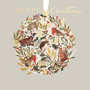 Introduce your customers to the charm of a British winter with this delightful Open Christmas card from Ling. This beautifully illustrated design showcases a festive bauble, intricately filled with lush foliage, vibrant red berries, and shimmering gold accents. Within this enchanting scene, you'll discover beloved woodland creatures: a majestic hare, a proud pheasant, a sweet hedgehog, a busy squirrel, and two cheerful robins. The elegant 'HAPPY Christmas' greeting, rendered in sparkling gold, adds a touch of seasonal luxury. Perfect for sending heartfelt wishes, this card beautifully captures the spirit of the holidays with its natural appeal and exquisite detail. Each pack contains 6 cards, ideal for your retail offering.