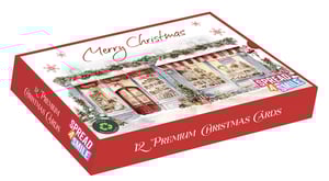 Bring festive cheer to your customers with our delightful 12 Landscape Premium 'Slide' Festive Village Cards. Each box contains 12 premium quality cards, all featuring a single, charming design of a beautifully decorated Christmas village street. The intricate artwork showcases quaint shops adorned with garlands and festive displays, perfect for spreading joy this holiday season.

These landscape-oriented cards come in a convenient 'slide' box, making them easy to display and access. With a clear 'Merry Christmas' message and a 'Spread a Smile' motif, they are sure to capture hearts. Plus, the 'Fully Recycled' logo adds an eco-friendly appeal. Available in a wholesale pack size of 1x6 from Out of The Blue Studios Ltd., these cards are an essential addition to your seasonal offerings.