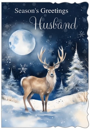 Offer your customers a truly special way to send Season's Greetings to their husband with this beautiful Christmas card from Out of The Blue Studios Ltd. This enchanting design features a majestic stag standing gracefully in a serene, snow-covered winter wonderland. A luminous full moon casts a gentle glow over the scene, while delicate snowflakes drift through the air, creating a magical atmosphere. The exquisite watercolour artwork captures the peaceful beauty of a winter's night, making this card a memorable choice. Each card is finished with elegant 'Season's Greetings Husband' text. Available in a convenient pack size of 1x6, these cards are perfect for retailers looking to stock high-quality, heartfelt festive greetings.