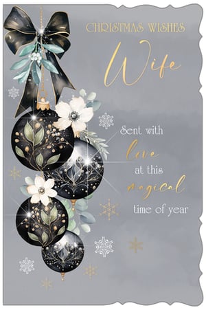 Make this Christmas truly special for your customers with our exquisite 'Wife' Christmas card, brought to you by Out of The Blue Studios Ltd. This elegant design features a sophisticated palette of black, gold, and grey, adorned with sparkling baubles, delicate white flowers, and lush festive foliage. A luxurious black bow adds a touch of class, while shimmering snowflakes complete the magical scene.
The heartfelt message, "CHRISTMAS WISHES Wife Sent with love at this magical time of year," ensures a warm and loving sentiment. Perfect for retailers looking to offer premium quality, this card comes in a convenient pack size of 1x6, ready to delight your customers this festive season.