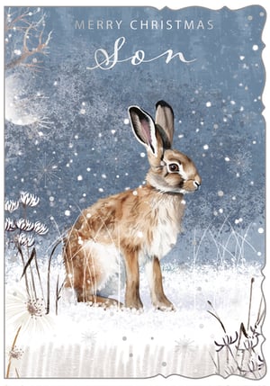 Make Christmas extra special for your customers' sons with this enchanting 'Son' Christmas card from Out of The Blue Studios Ltd. This beautifully illustrated card captures the serene magic of a winter's night, featuring a charming brown hare nestled amongst delicate snow-covered foliage. The soft blues and whites create a peaceful backdrop, with a subtle moon and sparkling snowflakes adding to the festive atmosphere. With 'MERRY CHRISTMAS Son' elegantly scripted, it's the perfect way to send warm wishes. Each pack contains 6 cards, ready to delight your customers looking for a truly special greeting.
