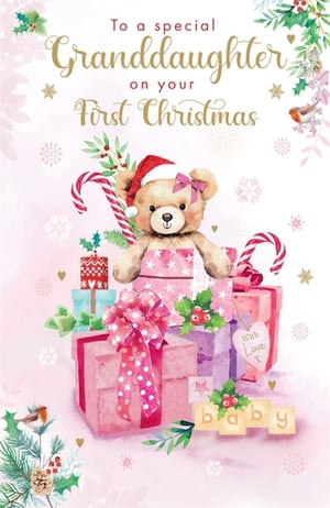 Celebrate a precious milestone with our 'Granddaughters 1st Xmas' card, a truly enchanting design from Paper Rose. This delightful card features an adorable teddy bear, complete with a Santa hat and a sweet pink bow, nestled amongst a charming stack of beautifully wrapped Christmas presents. The soft pink and festive green palette, adorned with candy canes, holly, and delicate snowflakes, creates a heartwarming scene perfect for a baby's first Christmas.
The elegant gold lettering wishes 'To a special Granddaughter on your First Christmas', making it an unforgettable keepsake. Subtle details like the 'baby' blocks and a tiny robin add to its charm. Stock up on this best-selling design, available in a convenient pack size of 1x6, and offer your customers the perfect way to mark this joyous occasion.