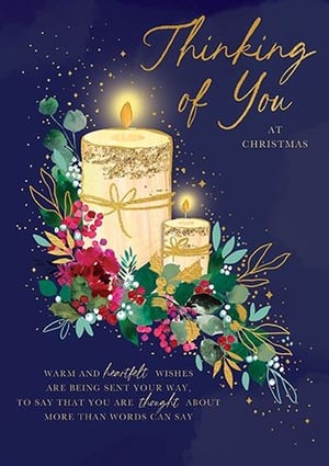 Offer your customers a truly heartfelt way to connect this festive season with our 'Thinking Of You' Christmas card. This beautiful design features two glowing candles, adorned with sparkling glitter accents, nestled amongst rich, festive foliage and berries, all set against a deep, starry blue background.
The elegant gold script conveys a warm message: 'Thinking of You at Christmas' and 'Warm and heartfelt wishes are being sent your way, to say that you are thought about more than words can say.' Perfect for those wishing to send a meaningful message to loved ones near or far. Supplied by Paper Rose, each pack contains 6 cards, ready to add a touch of warmth to your Christmas card selection.