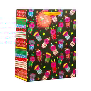 Get ready to spread some festive cheer with our delightful Large Pigs In Blankets Gift Bag! This charming bag showcases an adorable pattern of pink pigs, all dressed in their finest Christmas jumpers and hats, set against a deep green backdrop dotted with twinkling stars. The witty circular tag, proclaiming "ONLY HERE FOR THE PIGS IN BLANKETS," adds a touch of playful humour that's bound to bring a smile. With its generous size and vibrant, multi-patterned side panel, this bag is perfect for presenting those special Christmas gifts. Ensure your shelves are stocked for the holiday rush with this popular choice, available in a convenient pack of 6 from Partisan Products Ltd.