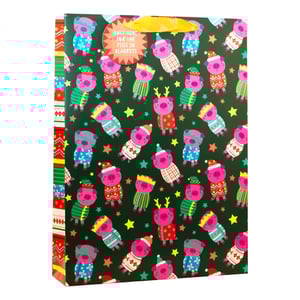 Get ready for festive gifting with our delightful Extra Large Pigs In Blankets Gift Bag! This charming bag from Partisan Products Ltd. features an adorable array of cartoon pigs, all dressed in their finest Christmas jumpers, hats, and even reindeer antlers, set against a vibrant dark green background scattered with colourful stars.

The playful circular tag proudly declares, 'ONLY HERE FOR THE PIGS IN BLANKETS,' adding a touch of humour to any present. Its extra-large size makes it perfect for those generous gifts, ensuring your customers can wrap up even the biggest surprises with style. Stock up on this wonderfully whimsical design, available in a convenient pack of 6, and bring a smile to every gift exchange this season!