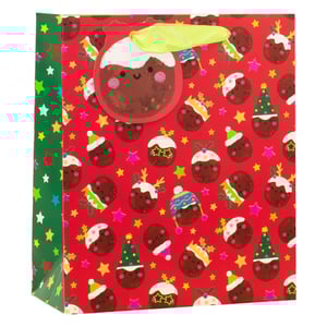 Get ready for a truly adorable Christmas with our Large Christmas Puds Gift Bag! This charming bag features a vibrant red background adorned with a delightful array of cute Christmas puddings, each sporting a unique festive accessory from Santa hats to reindeer antlers. The cheerful faces and bright colours, complemented by star-studded green side panels, make this bag an instant festive favourite. Perfect for holding those special Christmas gifts, its generous size ensures plenty of room for presents. Supplied by Partisan Products Ltd. in a convenient pack of 6, these bags are a must-have for your seasonal stock. Bring a smile to every gift recipient this holiday season with these delightful gift bags!