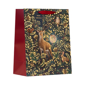 Present gifts beautifully this festive season with our Medium Enchanted Forest Gift Bag. This stunning bag features a magical woodland scene, perfect for Christmas. A majestic deer stands proudly amidst intricate golden foliage, berries, and a glowing moon. Look closely and you'll spot an adorable squirrel, a wise owl, and a charming rabbit, adding to the enchanting atmosphere.

The rich dark background is beautifully contrasted with shimmering gold accents and vibrant red details, creating a truly luxurious feel. A 'Merry Christmas' message is subtly integrated into the design. Finished with sturdy red handles and matching side panels, this medium-sized bag is both elegant and practical. Available in a convenient pack of 6 from Partisan Products Ltd., these bags are ideal for retailers looking to offer customers something truly special.