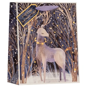 Make your gifts truly unforgettable with our enchanting Large Magical Reindeer Gift Bag. This beautiful bag features a serene reindeer, adorned with a delicate star garland, standing gracefully in a twinkling, snow-dusted forest. The rich, deep colours and shimmering gold accents create a wonderfully festive and magical feel. Complete with a 'Christmas Wishes' tag, it’s the perfect way to present your thoughtful presents this holiday season. A truly special touch for any gift.