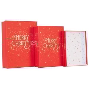 Make your festive gifting extra special with our delightful Set of 3 Merry Christmas Gift Boxes! Perfect for presenting a range of presents, this charming trio comes in varying sizes to accommodate all your thoughtful gifts. Each box boasts a vibrant red finish, beautifully adorned with shimmering gold 'Merry Christmas' lettering and a scattering of festive stars and dots. The coordinated design extends to the inside of the boxes, ensuring a truly magical unwrapping experience. Supplied by Partisan Products Ltd, these single-pack sets are a must-have for retailers looking to add a touch of sparkle to their Christmas offerings. Get ready to spread some serious holiday cheer!