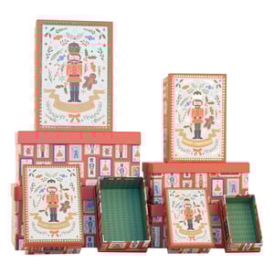 Elevate your customers' festive gifting with our charming Set of 10 Nutcracker Gift Boxes. This delightful collection features a classic Christmas design, starring a handsome nutcracker, a sweet gingerbread man, and festive foliage, all wishing a "Merry Christmas." The larger boxes boast a unique postage stamp pattern adorned with various holiday figures. Perfect for presenting gifts of all shapes and sizes, this set includes a range of dimensions, with some boxes revealing a lovely green patterned interior. Each Set of 10 offers a wonderful way to add a touch of traditional holiday magic to any present. Available as a single pack, these beautifully designed boxes are an essential addition to your seasonal offerings.