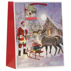Make gift-giving truly magical this Christmas with our Large Forest Santa Gift Bag. Adorned with a captivating illustration, this bag depicts Santa Claus in a serene, snow-covered forest, sharing a moment with his loyal reindeer. A rustic sled piled high with festive cushions completes this charming winter wonderland scene, all under the soft glow of a full moon. Its generous size makes it ideal for a variety of gifts, ensuring every present looks picture-perfect. An "eco-friendly" tag adds an appealing touch for conscious consumers. Stock up for the festive season with this delightful design, available in a convenient pack of 6 from Partisan Products Ltd.