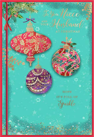 Help your customers share festive joy with this beautiful Christmas card for a special Niece and her Husband. From Simon Elvin, this card features a stunning design of richly detailed Christmas baubles in vibrant shades of red, gold, and purple, set against a festive teal background. Adorned with sparkling accents and delicate foliage, it truly captures the magic of the season. The heartfelt message wishes them a Christmas 'full of sparkle', making it a perfect choice for sending warm wishes. This eye-catching card is supplied in a convenient pack of 6, ideal for your seasonal display.