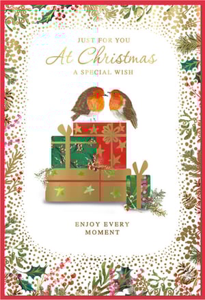 Offer your customers a touch of classic Christmas charm with this beautiful greeting card from Simon Elvin. Adorned with two sweet robins perched on a stack of festive presents, the design captures the heart of the holiday season. Elegant gold lettering conveys warm wishes: 'Just for you, At Christmas, A special wish' and 'Enjoy every moment'. The card is framed by a delightful border of golden foliage, holly, and berries, adding a luxurious feel. Perfect for retailers, these high-quality cards come in a convenient pack of 6, ready to help your customers share heartfelt greetings this festive period.
