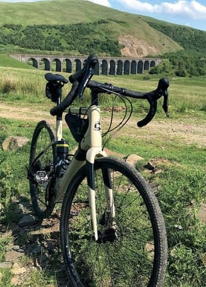 Introduce your customers to the breathtaking beauty of the Shankland Viaduct with this exquisite wholesale pack from Country Cards. This stunning image captures the iconic stone viaduct nestled amidst rolling green hills, under a clear blue sky – a truly picturesque scene that evokes a sense of adventure and tranquility.
Perfect for cycling enthusiasts, nature lovers, or anyone who appreciates magnificent British landscapes and historic engineering. Each card beautifully showcases the vibrant greens and impressive architecture, making it an ideal choice for any occasion. Stock up with our convenient 1x6 pack and offer your customers a piece of the UK's scenic charm.