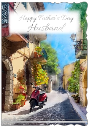 Make Father's Day unforgettable for Husbands with this exquisite card from Out of The Blue Studios Ltd. This charming design features a picturesque watercolour scene, depicting a sun-drenched European street. A vibrant red scooter is parked on the cobblestones, surrounded by quaint buildings, lush greenery, and blooming flowers, all under a clear blue sky. The artistic detail and warm hues create a truly special greeting. Perfect for retailers seeking unique and high-quality Father's Day cards, this design is sure to stand out. Supplied in a convenient pack size of 1x6.