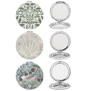 Introduce a touch of timeless elegance to your customers' everyday essentials with our exquisite William Morris Compact Mirrors. This charming assortment features three distinct and beloved William Morris designs, each beautifully rendered to capture the iconic artistry of the Arts and Crafts movement.

Perfect for handbags, travel, or a quick touch-up, these compact mirrors are not just practical but also a delightful fashion accessory. Each mirror opens to reveal a clear reflection, encased in a sturdy, stylish frame. The three unique patterns – from lush botanical motifs to a charming bird amidst berries – offer a wonderful variety, ensuring there's a favourite for everyone.

Stock up on these popular and beautifully crafted mirrors. They make ideal gifts and are sure to be a cherished item.

Product Name: William Morris Compact Mirror 3 Asst
Pack Size: 1x12
Supplier: Lesser and Pavey Ltd