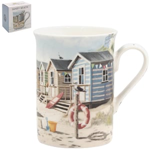 Bring the seaside charm to your customers with our delightful Sandy Beach Mug from Lesser and Pavey Ltd. This beautiful fine china mug features a picturesque scene of colourful beach huts nestled on a sandy shore, complete with a surfboard, bucket and spade, and a friendly seagull. Perfect for enjoying a cuppa, it evokes memories of sunny days by the sea. Each mug comes individually boxed in a matching gift box, making it an ideal present or a lovely addition to any kitchenware collection. A wonderful way to add a touch of coastal bliss to any home.