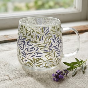 Introduce a touch of timeless elegance to your customers' homes with our exquisite Willow Bough Glass Mug. Inspired by the iconic William Morris design, this beautiful mug from Lesser and Pavey Ltd features an intricate pattern of intertwining green and deep blue leaves, bringing the serene beauty of nature indoors.

Crafted from clear, high-quality glass, it's perfect for enjoying a comforting tea, a refreshing coffee, or any favourite beverage. The transparent material beautifully showcases the drink within, while the classic pattern adds a sophisticated charm to any kitchen or dining setting. Sold individually, these mugs make a delightful gift or a cherished addition to any collection, offering both style and practicality.