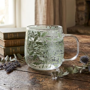 Introduce a touch of nature's charm to your homeware collection with our exquisite Acorn Glass Mug from Lesser and Pavey Ltd. This beautifully crafted mug features a captivating botanical design, showcasing intricate green oak leaves and delicate patterns that evoke the serene beauty of the forest. Made from high-quality clear glass, it offers a delightful way to enjoy any hot or cold beverage, from morning coffee to an evening herbal tea.
Perfect for adding a rustic yet refined accent to any kitchen or dining space, this mug combines practicality with timeless style. Its comfortable handle ensures a pleasant drinking experience. Available in single units, the Acorn Glass Mug is an ideal choice for retailers looking to offer unique and charming pieces that resonate with customers seeking natural elegance.