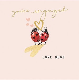 Congratulate the happy couple with this utterly charming Engagement card from Ling. Featuring two adorable 'love bugs' – sweet ladybirds – sharing a golden heart, it's the perfect way to celebrate their wonderful news. The elegant gold script announces 'you're engaged' against a soft pink background, complemented by delicate floating hearts and shimmering gold accents. This delightful design is sure to bring a smile to any newly engaged pair. Supplied in a convenient pack of 6, it's ideal for retailers looking to offer a heartfelt and beautifully designed card for this special occasion.