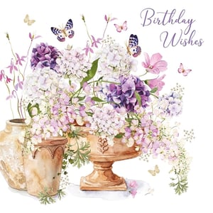 Celebrate special birthdays with this exquisite 'Open Birthday Female' card from Nigel Quiney Publications. This stunning watercolour illustration features a delightful arrangement of purple, lilac, and white hydrangeas, beautifully complemented by delicate butterflies fluttering amongst the blooms. The elegant 'Birthday Wishes' script adds a charming touch, making it perfect for sending heartfelt greetings to any woman. Its artistic design and gentle colours ensure it stands out as a truly lovely choice for any birthday celebration. Available in a convenient pack of 6, it's an ideal addition to your greeting card selection.