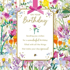 Brighten someone's special day with this enchanting 'Open Birthday Female' card from Nigel Quiney Publications. Adorned with a beautiful watercolour floral design, it bursts with vibrant shades of pink, purple, yellow, and blue, creating a truly eye-catching display. The elegant central panel, framed by a golden border and topped with a charming pink ribbon and bow, carries the heartfelt message: "ON YOUR Birthday, Sending you wishes for a wonderful Birthday filled with all the things that make your day special." Delightful details like a tiny bumblebee, scattered stars, and a delicate rose illustration add a touch of whimsy. Ideal for any female recipient, these lovely cards are supplied in a convenient pack of 6, perfect for stocking your shelves.