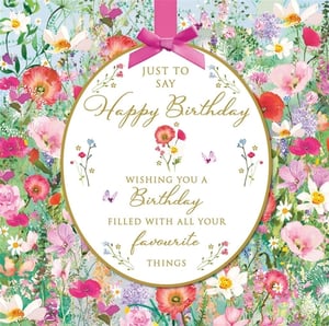Introduce a touch of floral elegance to your card display with this delightful Open Birthday Female card from Nigel Quiney Publications. This charming design showcases a vibrant meadow of wildflowers, bursting with cheerful poppies, daisies, and delicate foliage in a beautiful palette of pinks, reds, and purples. A central oval panel, elegantly framed and topped with a pretty pink ribbon and bow, features the warm sentiment: "Just to say Happy Birthday Wishing you a Birthday filled with all your favourite things." The golden script adds a luxurious finish. Ideal for celebrating any woman's special day, this popular card is a wonderful addition to any retail collection. Available in a convenient pack of 6.