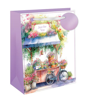 Present gifts beautifully with our enchanting Large Flower Stall Gift Bag from Out of The Blue Studios Ltd. This delightful bag showcases a stunning watercolour illustration of a picturesque flower stall, brimming with vibrant blooms and lush greenery. A charming vintage bicycle adds to the scene, while the "Just for You" message provides a thoughtful touch. Perfect for birthdays, anniversaries, or any special occasion, its generous size and sturdy construction make it ideal for a variety of gifts. Each pack contains 6 of these high-quality, eye-catching bags, ensuring your customers can add a touch of floral elegance to every present.