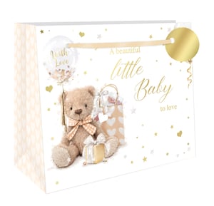 Welcome a new arrival with our charming Extra Large Birth Neutral Shopper Gift Bag! Perfect for baby showers or welcoming gifts, this spacious bag features an adorable teddy bear surrounded by presents, a "With Love" balloon, and delicate gold stars and hearts. The sweet message "A beautiful little Baby to love" adds a heartwarming touch.
Designed with elegant ribbon handles and a matching gold gift tag, it's sure to make any baby gift feel extra special. The neutral colour palette, with its soft hearts on the side, makes it ideal for any gender. Available in a convenient pack of 6, these delightful bags are a must-have for your retail offering.