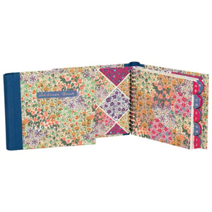 Keep your contacts beautifully organised with our Liberty Garden Address Book from Partisan Products Ltd. This charming address book features a vibrant, intricate floral design, bringing a touch of garden elegance to your stationery collection.
Inside, you'll find convenient alphabetical tabbed dividers, making it effortless to locate addresses and phone numbers. The durable spiral binding ensures it lays flat for easy writing and prolonged use. Perfect for personal use or as a delightful gift, this address book is sold as single units, ready for your retail display. A truly lovely and practical addition to any home or office.