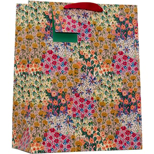 Add a burst of floral charm to your gift-giving with our Large Liberty Garden Gift Bag. This beautiful bag features a vibrant, all-over pattern reminiscent of a blooming meadow, showcasing a delightful array of reds, pinks, yellows, blues, and greens. The intricate design and rich colours make it perfect for any special occasion, from birthdays to anniversaries.
Crafted with attention to detail, it includes a sturdy red ribbon handle and a neat green inner flap, ensuring a quality presentation. Supplied by Partisan Products Ltd, these eye-catching bags come in a convenient pack size of 1x6, ready to enhance your retail offering and make every gift feel truly unique.