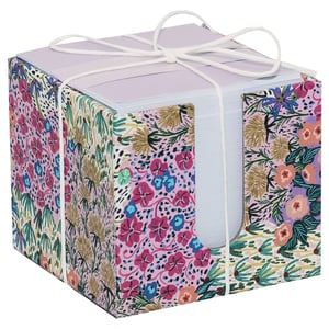 Introducing the delightful Liberty Garden Memo Block from Partisan Products Ltd. This charming memo block is a true desk essential, combining practicality with exquisite style. Encased in a vibrant, eye-catching holder, it features a beautiful floral pattern inspired by a classic garden, bursting with an array of colourful blooms and lush foliage.
The soft lavender memo paper inside is perfect for jotting down notes, reminders, or little messages. Neatly tied with a simple white string, this single memo block arrives ready to brighten any workspace or make a thoughtful gift. Add a touch of elegance and colour to your stationery collection with this lovely item.