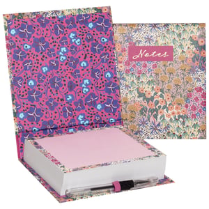 Add a burst of botanical beauty to your stationery collection with our enchanting Liberty Garden Noteblock! Supplied by Partisan Products Ltd, this delightful set is a true desk essential, presented in a charming, book-style box. Open it up to reveal a generous stack of pretty pink note paper, ready for all your important thoughts and reminders. A coordinating pen is cleverly included, ensuring you're always prepared to jot down ideas.
The vibrant fuchsia floral pattern of the main box is beautifully complemented by a separate 'Notes' book, featuring a softer, intricate garden design. Perfect for gifting or simply brightening your own workspace, this noteblock set combines practicality with exquisite style. Available as single packs.