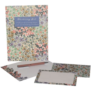 Discover the enchanting Liberty Garden Writing Set Pouch, a truly beautiful addition to any stationery collection. This exquisite set features a vibrant, intricate floral design, bringing a touch of nature's beauty to every message.
Inside the charming pouch, you'll find 10 sheets of high-quality writing paper, each with a delicate floral border, perfectly complemented by coordinating envelopes. It's ideal for sending heartfelt letters, thank you notes, or simply enjoying the art of handwritten correspondence. A wonderful gift or a treat for oneself, this writing set promises to inspire.
Stock up on this delightful item, available in a convenient pack of 6.
