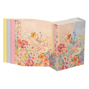 Bring a burst of natural beauty to your desk with our charming 6 Saffron A6 Notebooks With Stand. This delightful set includes six A6 notebooks, each featuring a vibrant wildflower design that wraps around a soft, warm-toned cover. Bursting with cheerful oranges, pinks, yellows, and blues, these notebooks are perfect for capturing your thoughts, to-do lists, or creative ideas. They come complete with a matching stand, elegantly decorated with the same captivating floral pattern on a calming grey-blue, ensuring your notebooks are always tidy and accessible. Sold as a single pack, this set makes a wonderful gift or a lovely addition to your own stationery collection, blending practicality with picturesque design.