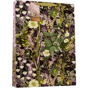 Present your gifts in style with our Extra Large Hedgerow Gift Bag. This stunning bag features a rich, deep purple background adorned with an intricate and vibrant botanical design. Delicate white and cream flowers, alongside lush green foliage, create a beautiful wild garden feel. Its extra-large size makes it perfect for those bigger presents, ensuring your thoughtful gift is beautifully presented for any special occasion. From birthdays to thank yous, this gorgeous bag adds an elegant touch, making every present feel extra special.