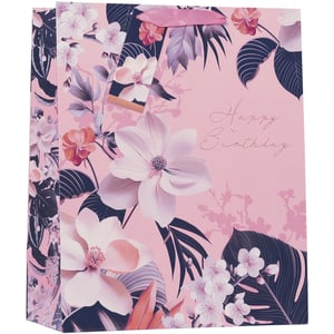 Make someone's special day even brighter with our delightful Large Zara Gift Bag. This elegant bag showcases a beautiful floral design on a soft pink background, featuring graceful magnolias, delicate blossoms, and lush foliage in complementary shades of pink, white, and deep blue. The "Happy Birthday" message, rendered in a charming script, adds a sophisticated touch. Its generous size makes it ideal for presenting a wide array of thoughtful gifts, while the sturdy construction and coordinating ribbon handles ensure a lovely presentation. Perfect for any celebration, these attractive bags are available in a convenient pack of 6, making them an excellent choice for retailers seeking quality and style.