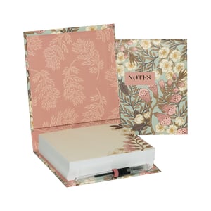 Introduce a touch of botanical beauty to any desk with our exquisite Foxglove Noteblock. This charming set, from Partisan Products Ltd, features a generous block of plain notes housed within a beautifully designed, sturdy box. The elegant foxglove and floral patterns, in soft pinks, creams, and greens, evoke a sense of timeless style, with a complementary leafy design adorning the inside lid.
Perfect for jotting down thoughts, reminders, or messages, this noteblock also includes a convenient pen, ensuring you're always ready to capture inspiration. Sold as single units, the Foxglove Noteblock makes a delightful gift or a sophisticated addition to any stationery collection. A lovely and practical item for home or office.