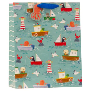 Set sail for smiles with our Large Ahoy There Blue Gift Bag! Perfect for any occasion, this charming bag features an adorable nautical design that's sure to delight. Little ones and sea-lovers alike will adore the playful puffins, friendly octopuses, and cute otters cruising in their boats, alongside lighthouses and seagulls. The vibrant blue background, complete with gentle waves and tiny fish, creates a captivating underwater world. Each large bag is crafted with care, making it ideal for presenting gifts of all shapes and sizes. Available in a convenient pack of 6, these delightful gift bags are a must-have for your retail collection, ready to add a splash of fun to any present.